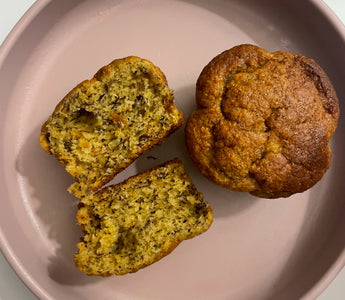 Fresh muffin sliced on pink plate, ideal for mess-free mealtime with easy cleanup